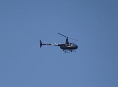 OE-XOS Robinson R44 over Tallinn Bay